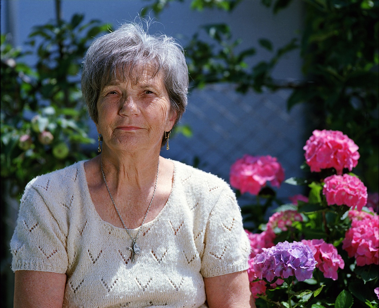 Elderly woman sharing her life story during a professional legacy interview session