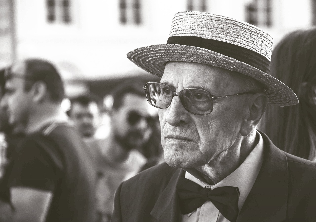 Distinguished grandfather sharing wisdom during his legacy video interview